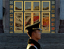 MARK RALSTON/AFP/Getty Images Police stand guard as the Communist Party plenum takes place behind closed doors.